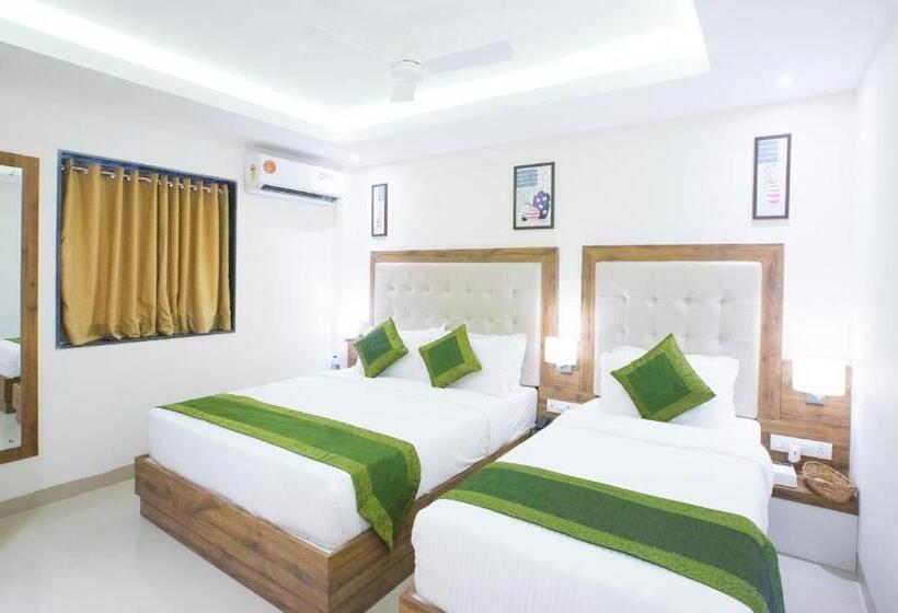 בית מלון כפרי Treebo Amber International