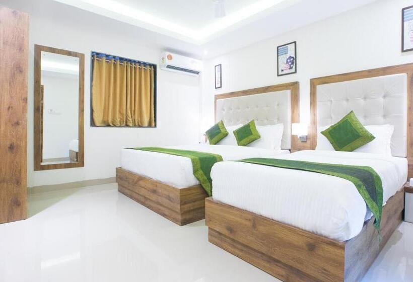 בית מלון כפרי Treebo Amber International