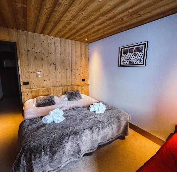 Отель Chalet Les Rhodos