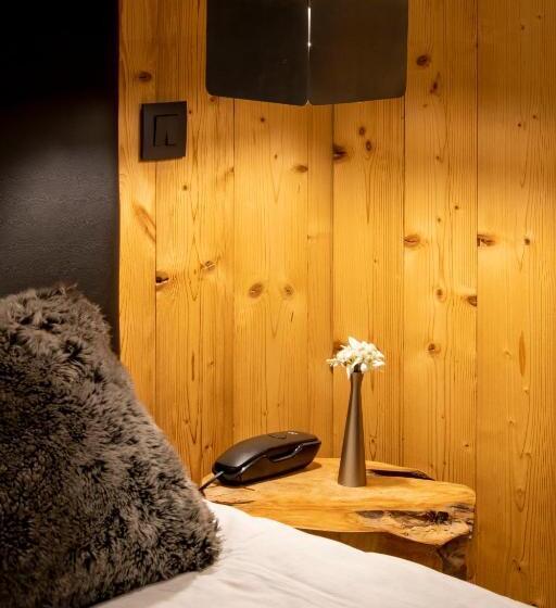 Отель Chalet Les Rhodos