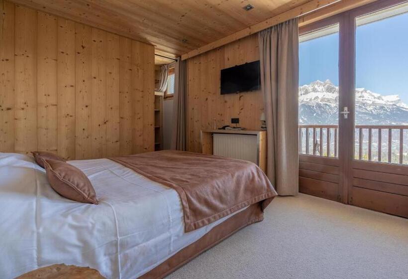 Отель Chalet Les Rhodos