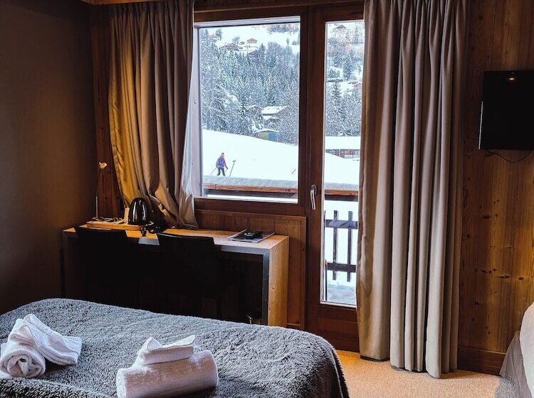 Отель Chalet Les Rhodos