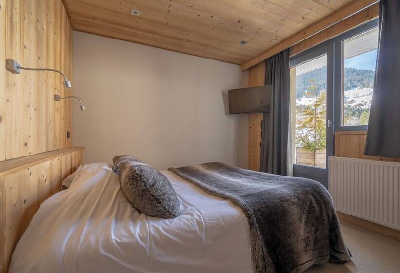 Отель Chalet Les Rhodos