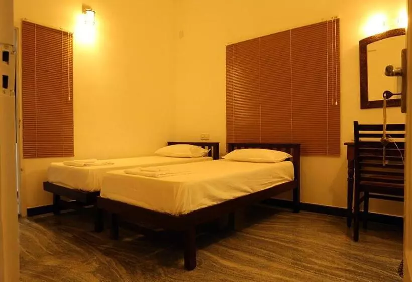 تختخواب و صبحانه Janatha Homestay