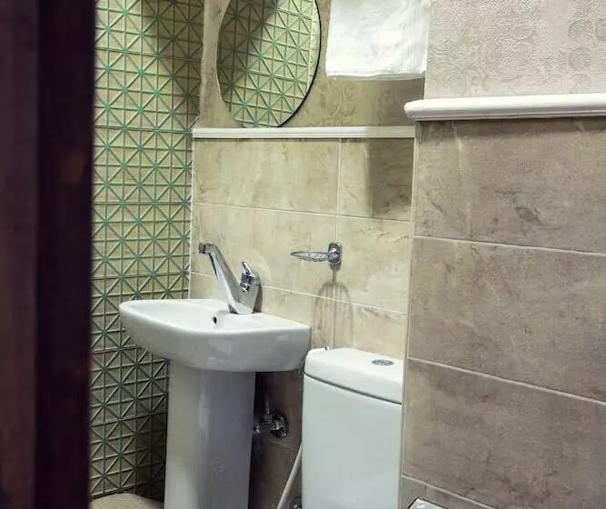 تختخواب و صبحانه Tahrir Plaza Suites   Museum View