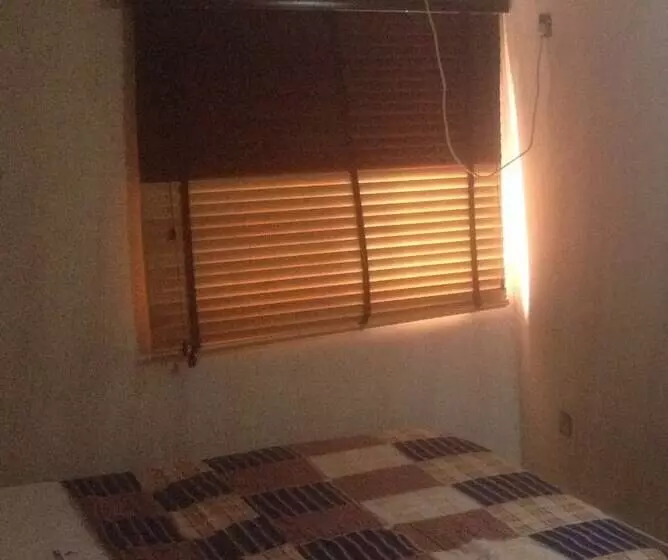 Glasshouse Hotel And Suites