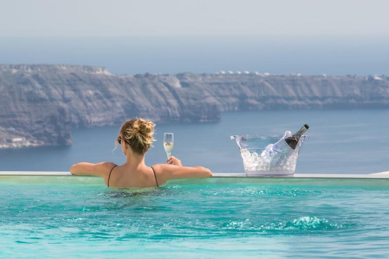 Отель Mythical Blue Luxury Suites