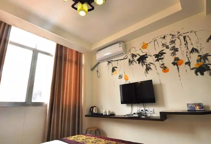 Hotelli Zhanguajiajie Huluju Inn