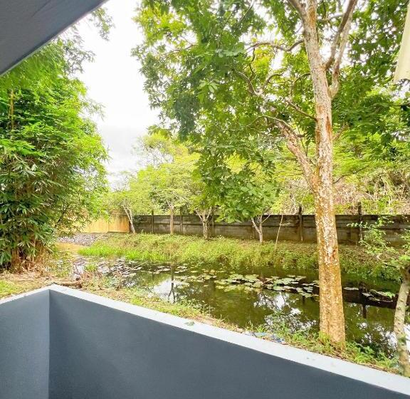 호텔 Srikij Garden Home Resort