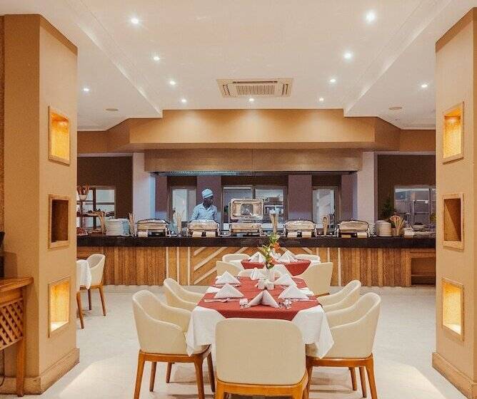 Отель Tanga Beach Resort & Spa