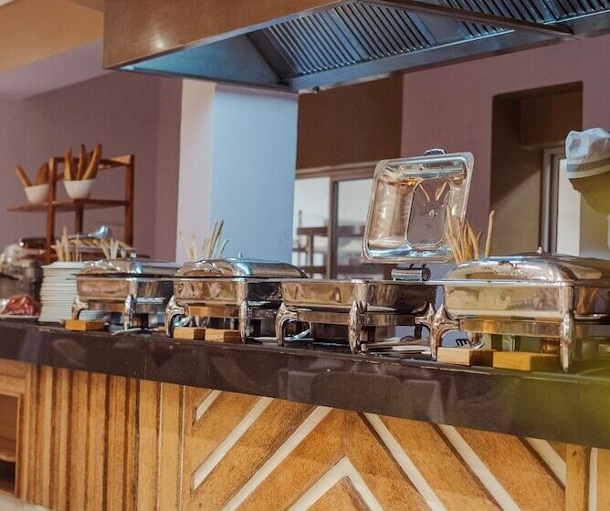 Отель Tanga Beach Resort & Spa