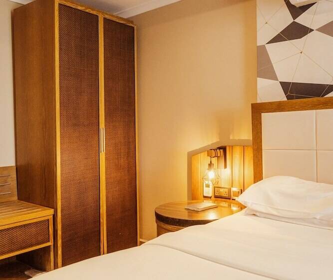 Отель Tanga Beach Resort & Spa