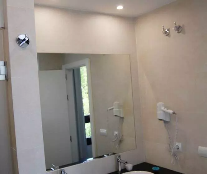 ペンション Hostal Tres Campanas