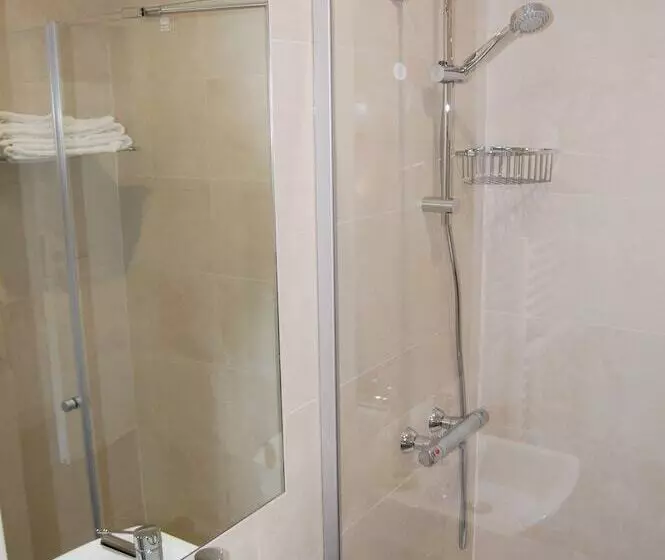 ペンション Hostal Tres Campanas