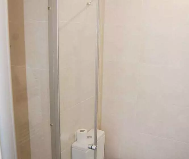 ペンション Hostal Tres Campanas