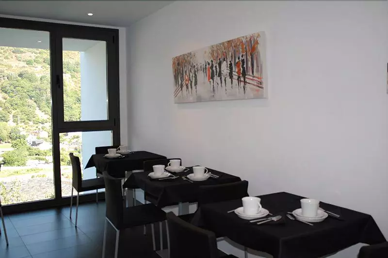 ペンション Hostal Tres Campanas