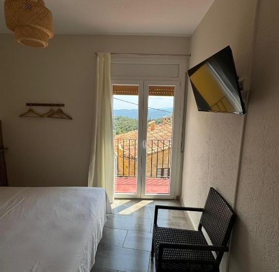 펜션 Hostal Restaurant Casa Comaulis