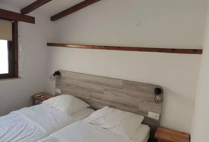 The Olive Mill Apart