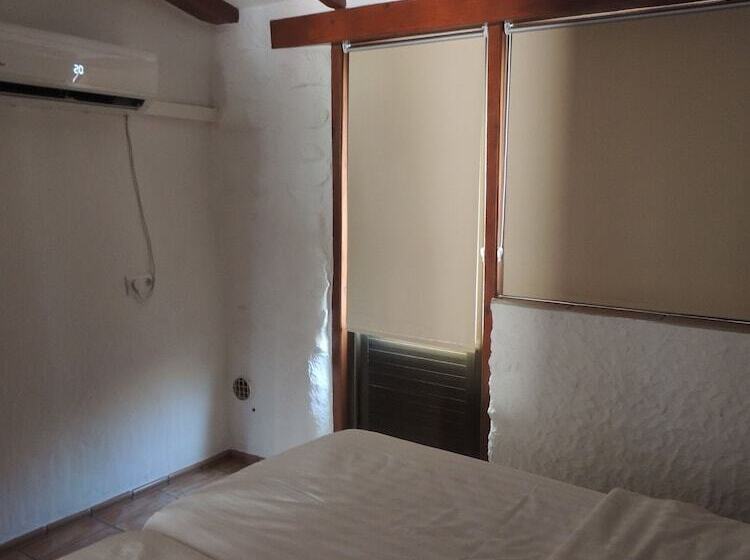 The Olive Mill Apart