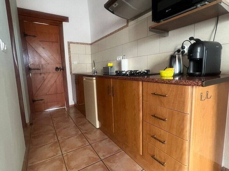 The Olive Mill Apart