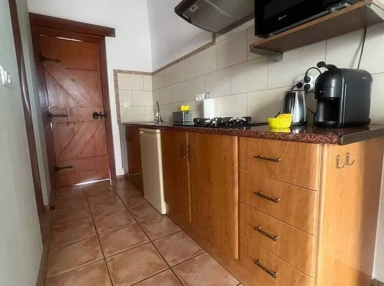 The Olive Mill Apart