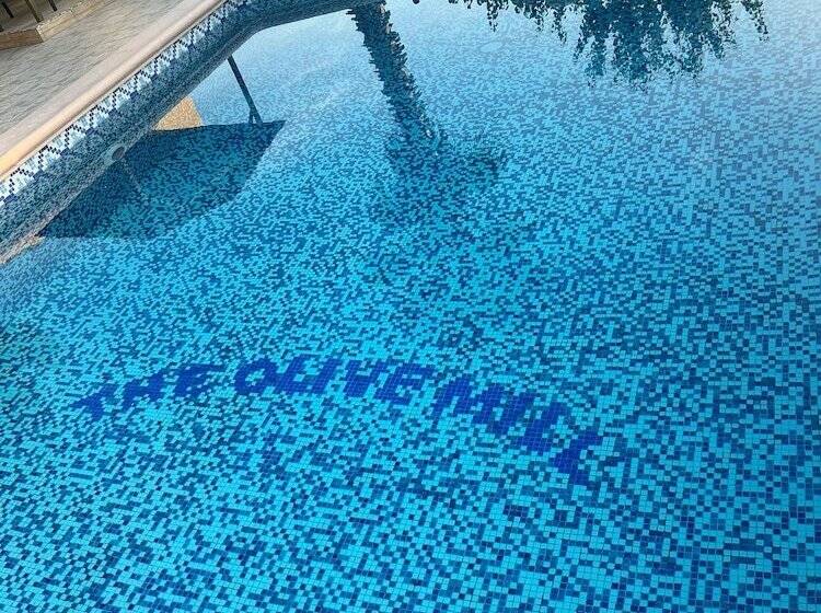 The Olive Mill Apart