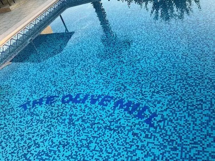 The Olive Mill Apart