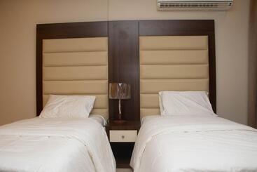 Отель Durrat Manzli Apart