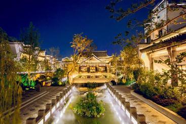 בית מלון כפרי Xinhualian Lvxingu