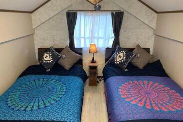 تختخواب و صبحانه Sunset Inn Churasun