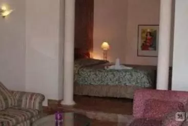 استراحتگاه Hotel Reina Cumayasa Beach & Suites