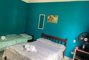 پانسیون Suítes Doce Lar