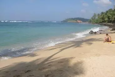 Pensjonat Sunray Rest Beach View Homestay
