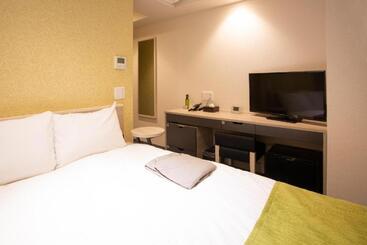 Отель Kuretake Inn Osaka Midousuji Hommachi