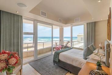 بنسيون Waves Of Grace Seafront Villa