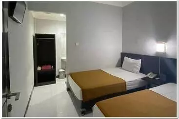 Panzió Losmen Family Syariah Bypass Juanda Mitra Reddoorz