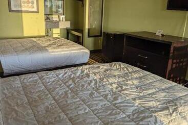 בית מלון כפרי Sunset Palm Condominium