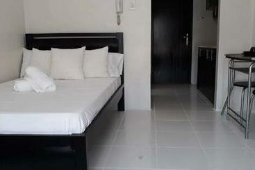 Апарт-отель Cozy Studio @ One Capitol Condo 2nd St. Kapitolyo