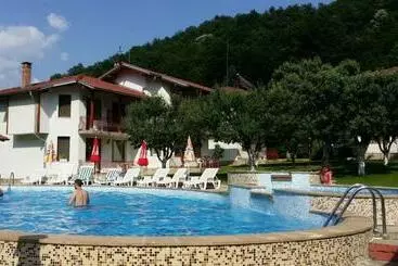 By The River Hotel Complex