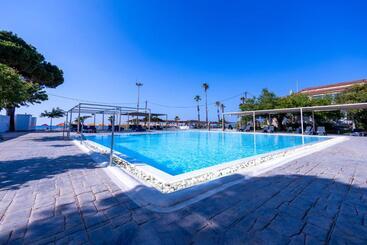 Отель Buka Sandy Beach