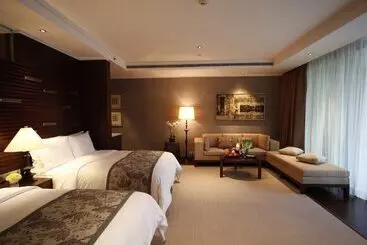 בית מלון כפרי Raffles Hainan