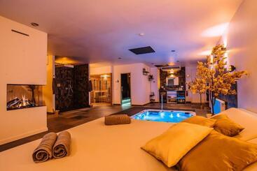 Bed and Breakfast Maas En Waal Wellness & Suites