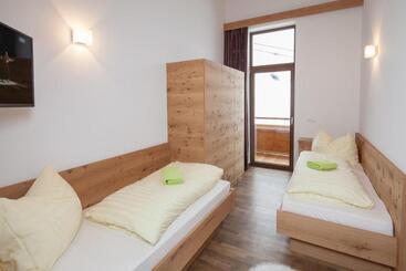 ホテル Berggasthof Hochzeigerhaus