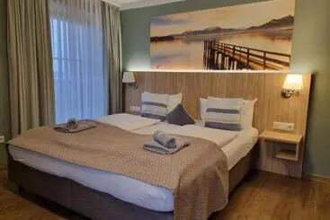 Пансион Gasthof Chiemseefischer