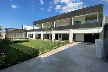 Жильё для туристов Amplia Eco Casa,alberca, Jardín,4 Hab,equipada