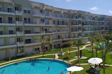 Turistlägenheter Lux Apartment In Bouznika With Pool