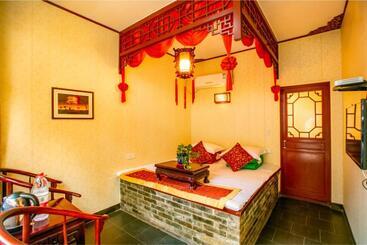 Отель Pingyao Ji Family Courtyard Inn