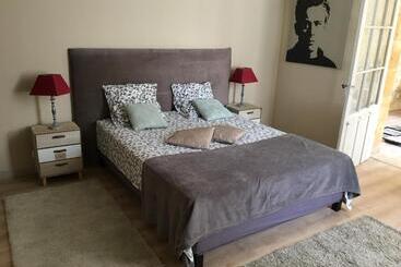 Bed and Breakfast Un Jardin En Ville