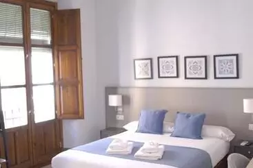 Gæstgiveri La Perla Granada Suites