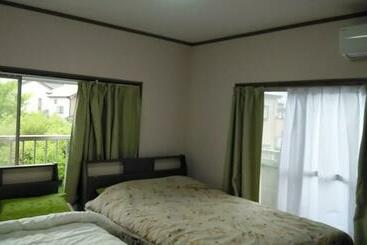 פנסיון コウノトリの里の宿